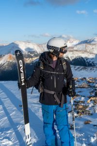 On the summit prepared to ski down in Colorado