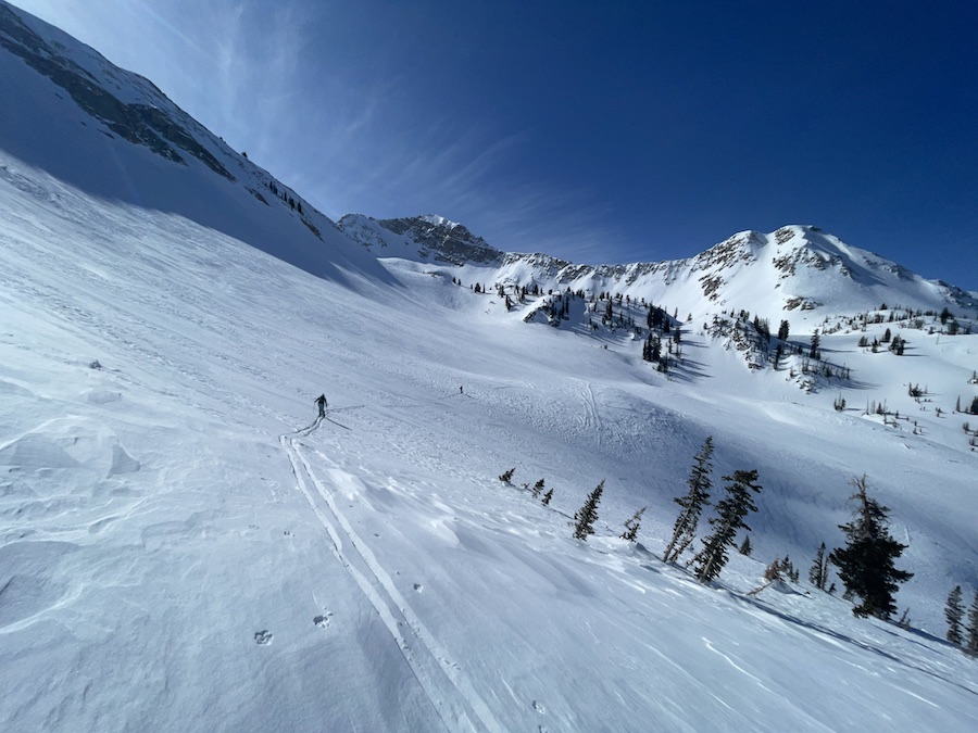 Insulated Hard Shell Jacket in ski tour with high winds and beautiful scenery.