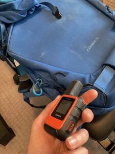 Garmin InReach Mini on our backpack