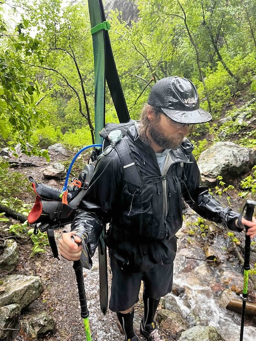 Trion 38 in pouring rain with ski gear